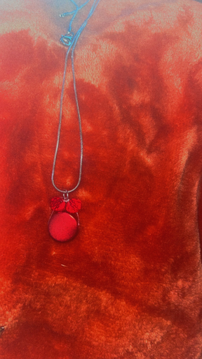 red and silver necklace